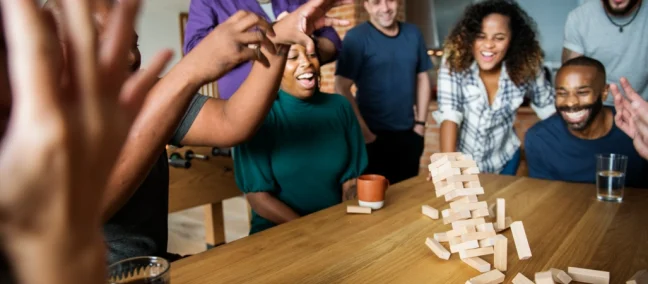 friends-playing-game-together-home 1